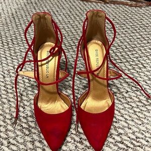 Red laces up heel